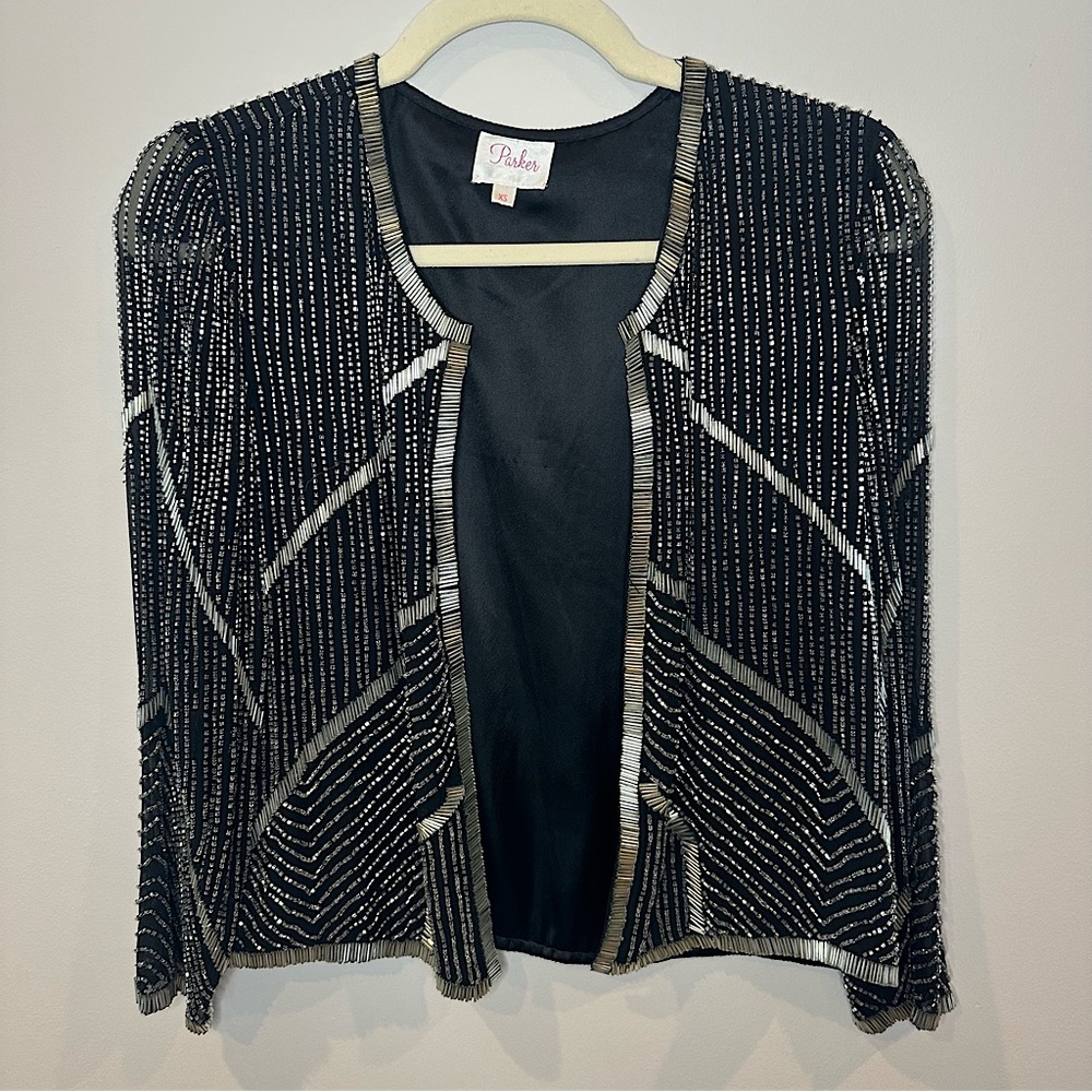 Black and silver sequined cropped jacket with silk lining by “PARKER”